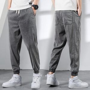 Męskie spodnie Ice jedwabne jeansy luźna osobowość męska moda dziewięciopunktowa letnia cienka sekcja plus rozmiar 5xl