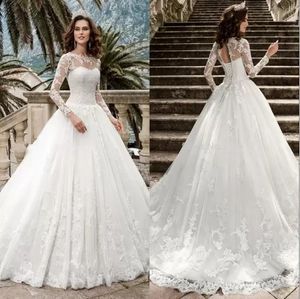 Nuovi abiti da sposa scintillanti con abiti da ballo Abiti da sposa trasparenti con collo gioiello applicati con paillettes maniche lunghe in pizzo Abiti da sposa su misura