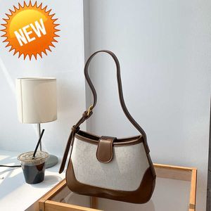 Luxury Designer bags Autumn hand Female Minority triumphal arch underarm high sense shoulder ins female fashion splicing canvas Factory direct sales