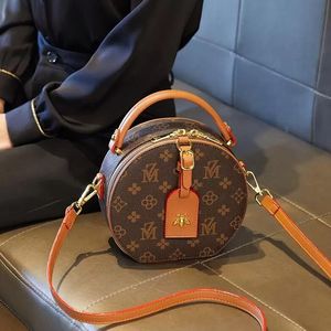 Tasarım Yuvarlak bir omuz crossbody çanta 2022 moda yuvarlak çantalar çok yönlü baskılı yuvarlama kek çantası kadın el çantası