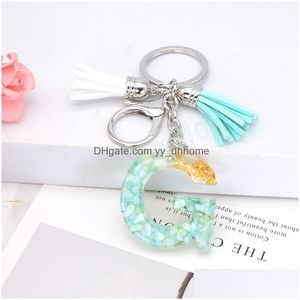 Nyckelringar Söt akryl engelska 26 bokstav Tassel Keychains Kvinnor Guldhartsbil Bag Charm Pendant Gift Key Ring Accessory Drop Delive DHCZP