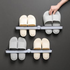 Klädlagring fällbara badrum tofflor rack vägg hängande sko artefakt toalett gratis stans sandal hylla