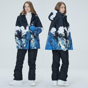 スキースーツ防水防風スノーボード衣類男性女性温かい厚い韓国のフード付きジャケットパンツ