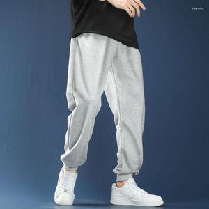 Męskie spodnie swobodne bawełniane spodnie dresowe szary mężczyźni moda jogger solidny luźne czarne spodnie wiosna lato przytulne jogging m-5xl