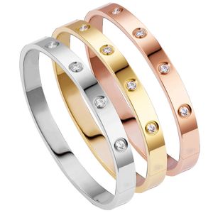 Bracciale rigido per amanti di lusso Bracciale rigido per coppia di cristalli in acciaio inossidabile Bracciale con zirconi dorati Regali per gioielli da uomo e donna