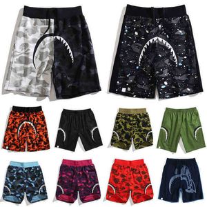 Herr shorts strand shorts herrar sport byxor kvinnor bada apa tröjor sommar kamouflage kort byxa mode brev tryckning lysande hajhuvud