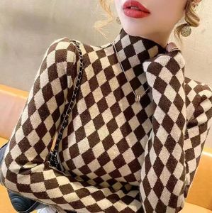 Kvinnors tröjor för designer koreansk lyx tryckt Turtleneck Puff Dress T -shirt för avslappnade feminina kläder