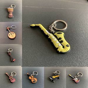 Moda Classic Guitar Keychain Chain Chain Chain Silicone Key Ring Instrumentos musicais Acess￳rios pendentes para homem Presente de mulheres