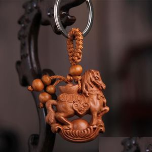 Key Rings Natural Peach Wood 12 Zodiac Key Chain For Women Men Child Unisex Jewelry Keyrings Animal Monkey Rabbit Snake Tige Yydhhome Dhmyd