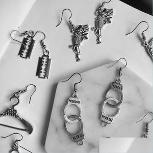 Dangle Chandelier Creativity Punk Handcuffs Blade Gun Dangle Earrings For Women Men Simple Cool Pistols Earring Antique Si Yydhhome Dh1Xz