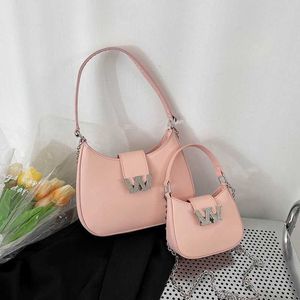 Недавняя сумка для подмышек через плечо Wang Bags 2022 Новая высококачественная модная женская сумка с буквенным принтом Простая сумка-мессенджер на одно плечо