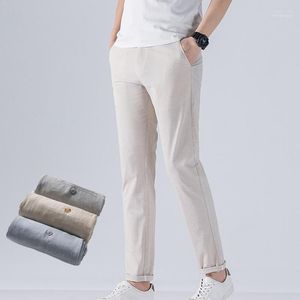 Calça masculina masculino casual de praia com grandes tamanhos altos tamanhos masculinos fiados de algodão liso de algodão calçada