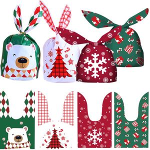 50pcs/paket tavşan kulağı Noel şeker çantaları hediye sargısı plastik karton Noel claus kardan adam hediyeler 2023 Noel kurabiyeleri paketleme malzemeleri