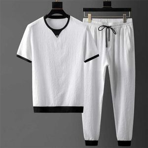 Herrspårssatser Set Summer Short Sleeve Tops Elastic midjebyxor Kläder Tvådelat Set Korean Streetwear Tracksuit Big Size G221010