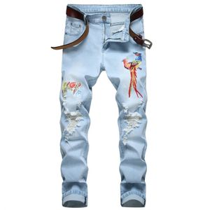 Personalidade de moda de jeans masculina Rapped jeans calças de jeans homens bordados de flores de flores de flor de jeans Trendência Retro mendigo calça 221008