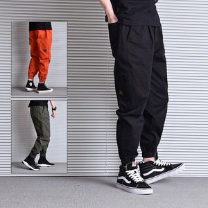 Jeans masculinos masculinos de rua masculinos soltos Fit Fit Boletes Bolsos Casuais Calças Hombre Japonês Designer Vintage Hip Hop Joggers