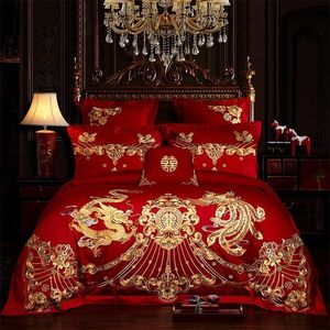 Set di biancheria da letto Highend Red Luxury Gold Phoenix Loong Fiori Ricamo Cinese Wedding Set biancheria da letto in cotone Copripiumino Lenzuolo Federa 221010