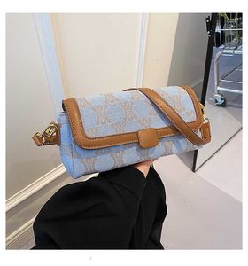 Borse firmate Arc De Triomphe New Single Shoulder Women's Underarm Denim Pu Splicing Method Bag Msenger Foreign Style Versatile Vendita diretta in fabbrica Pochette da sera