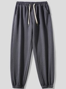 Tamaño de tamaño pequeño Tamaño de pedido de hombres Pantalones deportivos sueltos de color sólido para hombres en venta