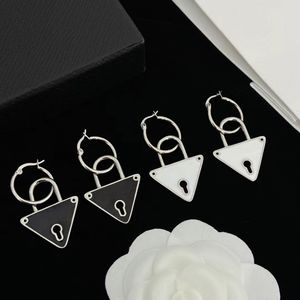 Pendientes de lujo Vintage con forma de oreja, Pendientes redondos de aros, Pendientes bohemios blancos y negros, Pendientes colgantes de marca de moda, joyería triangular