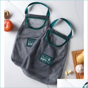 Borse portaoggetti Cucina Zenzero Aglio Cipolla Portare a mano Frutta Verdura Stoccaggio Borsa appesa Cava Traspirante Cocina Accessorio Nuova vendita 1 Dhc62