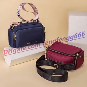 Toppdesigner H￶gkapacitet axelv￤skor Kamera Kameror Kvinnor Fashion Tie Dye Luxury Nylon Crossbody Flash Strap Multicolor Handbag Purse