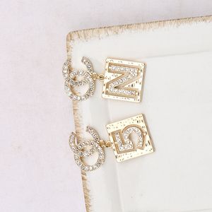 Semplice oro 18 carati placcato argento 925 designer di marca di lusso lettere Stud geometrico donne famose rotondo cristallo strass orecchino di perla festa di nozze Jewerlry MM1992