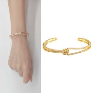 Breiter Armreif für Damen, vergoldet, geknotete Manschette, Luxus-Designer-Accessoire, harte Armbänder, Weihnachtsgeschenk, weiblich, Kupfer, elegante Hochzeitsgeschenke