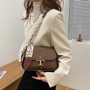 Borse Borsa da donna 2022 Autunno e inverno Versatile borsa da ascella portatile Nastro stile occidentale una spalla a tracolla da donna