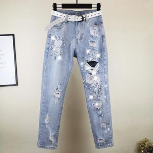 Kvinnors jeans Kvinnors tunga industri p￤rlor rippade 2022 sommaren h￶g midja tiggar nio po￤ng pappa baggy byxor mamma