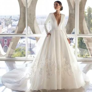 Modern Long Sleeve Satin A-Line Wedding Dresses Bridal Gowns Lace Appliques V-Neck Hollow Back Buttons Ivory White Color Simple Chapel Garden Robe De Mariee 2023