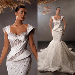 Abiti da sposa a sirena con paillettes glitterati Abito da sposa con pieghe a cuore Abiti da sposa scintillanti con perline su misura