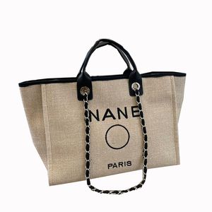 Женские классические Canvas Beach Shopping Bags Deaville Chain Silver Metal Аппаратный аппаратный багаж большой емкость 4 цвета роскошные дизайнерские сумочки 37x28см