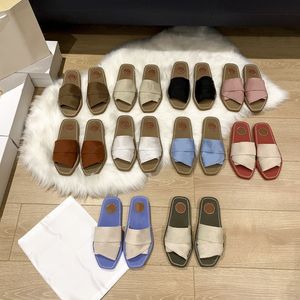 Modedesigner kvinnor glida sandaler band vävt gummi platt flip flops woody platt muller skor tofflor