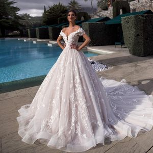 Charming ball gown Wedding Dresses Lace Backless beaded Bridal Gowns Plus Size Appliqued Spaghetti Straps Neckline Sweep Train Tulle Vestido De Novia