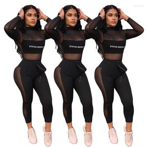 Pantaloni a due pezzi da donna See Through Black Mesh Sheer Crop Top Elastico in vita Abito attillato Lettere stampate Night Club Wear Set di pezzi DYX9030