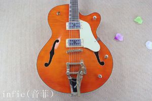 Jazz Orange Electric Guitar con guitarra vibrato Hollow Body al por mayor
