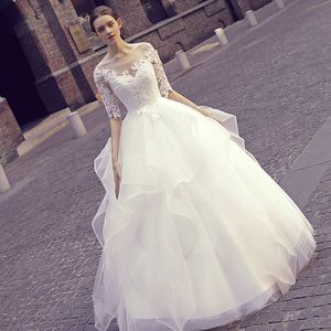 2023 Ballkleid Brautkleider Lange Illusionsärmel Spitze Applikation Juwel Sheer Neck Perlen Perlen Maßgeschneiderte Kapellenhochzeit Plus Size Brautkleider