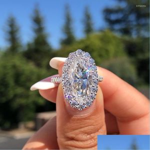 An￩is de casamento Ringos de casamento mulheres luxuosas grandes anel de noivado de cristal oval de cristal sier zircon stone vintage para womenwedding dhliv