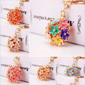 Keychains Lanyards Chic Hollow out Flower Metal Key Chains Rings Exquisite Purse Bag Buckle Pendant For Car Keyrings Keychains Dro Dhon7