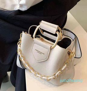 Mini lyxiga kvinnors hink väska kvalitet läder shoppare axel crossbody väskor tjock kedja designer tote handväskor och plånböcker 2022