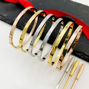 316L de aço inoxidável charme de bangulles de amortecedores de fenda de ouro rosa para mulheres e homens Jóias de jóias de casal de jóias pulseiras com bolsa de veludo