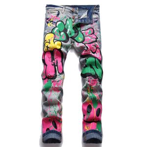 Erkekler kot pantolon erkekler renkli doodle boyalı denim sokak kıyafeti punk streç baskı pantolon 2023 düğme delikleri yırtılmış ince kalem pantolon