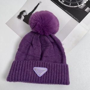 Designer hair ball hat women's wool knitted warm flanged autumn and winter fashion triangle label hats