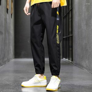 Męskie spodnie Joggers bieganie streetwearu Mężczyźni czarne khaki sznurki dresowe dresowe presy swobodne spodnie mody technologiczne długie pantelony