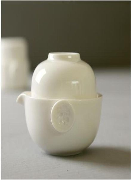 Venda direta da fábrica conjunto de viagem de porcelana branca um pote e um copo fácil de beber oolong T1067361604