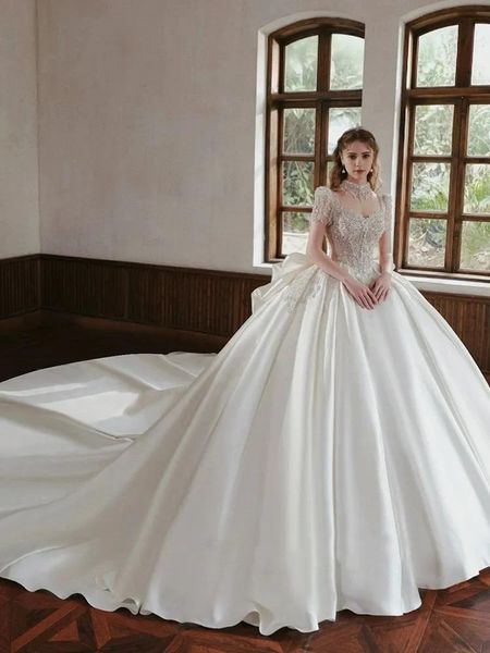 Abiti 2023 i più nuovi abiti da ballo di lusso Abiti da sposa Ricamo in rilievo Abito da principessa Corsetto Collana a cuore in raso Cattedrale di treno Plu