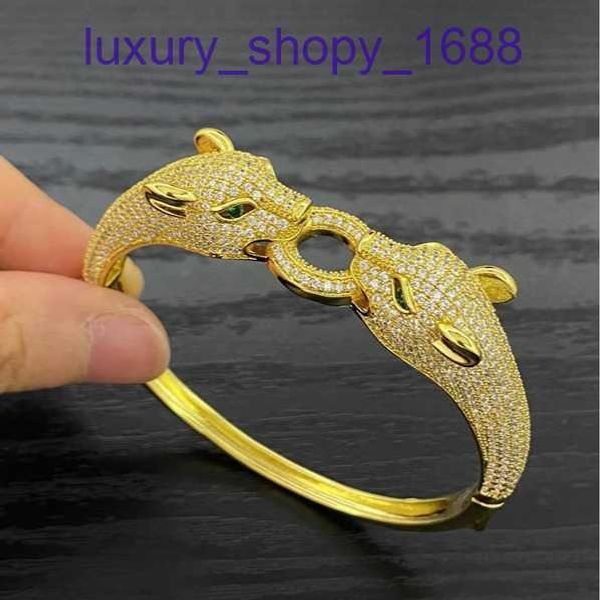 Das beliebte Luxus-Designer-Armband von Autoreifen. Niedrigpreisiges Accessoire, koreanisches graviertes 18-Karat-Gold-Kupfer-Material, klassischer Leopardenmuster für Damen von Have Original Box
