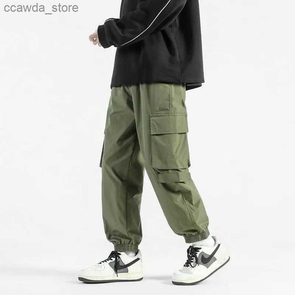 Мужские брюки Уличная одежда Брюки-карго Мужские брюки в стиле хип-хоп с несколькими карманами Harajuku Повседневные бегуны Шаровары Мужские повседневные брюки большого размера S-5XL Q240104