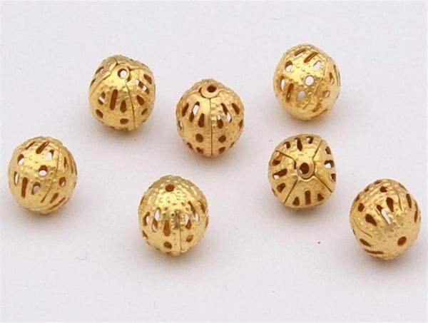 1000 pz / lotto Nuovi Charms Perline distanziatrici in rame con sfera cava allentata placcato oro 4mm290E1546291